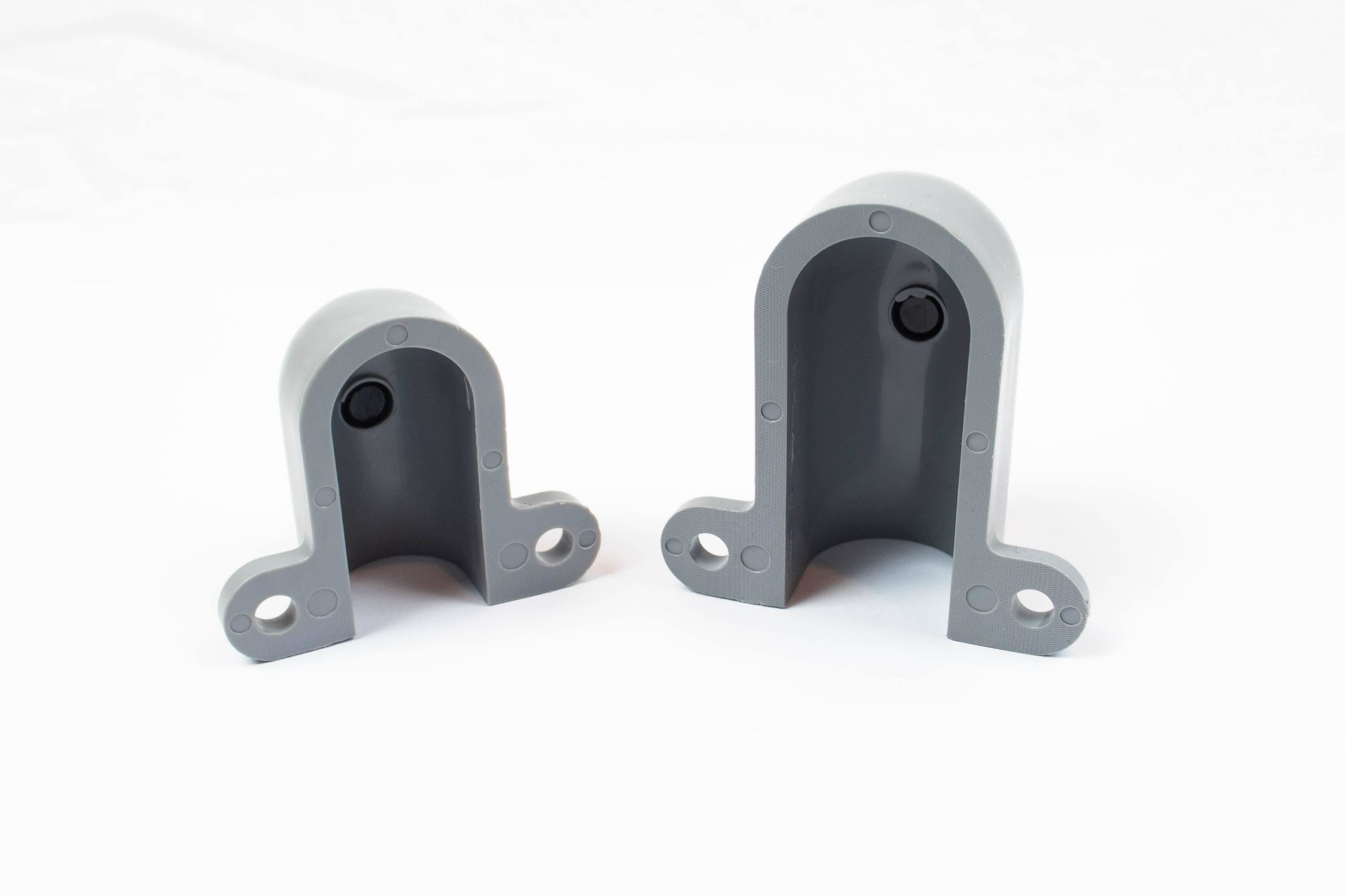 Gray hardscape lighting connectors on white background